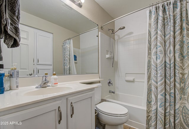 2325 S 88th Dr, Tolleson, AZ 85353 - full bathroom featuring vanity, shower / tub combo, and toilet