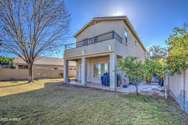 2325 S 88th Dr, Tolleson, AZ 85353 - back of property with a patio, a balcony, and a lawn