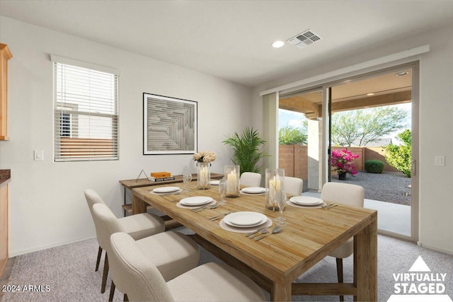 view of carpeted dining room