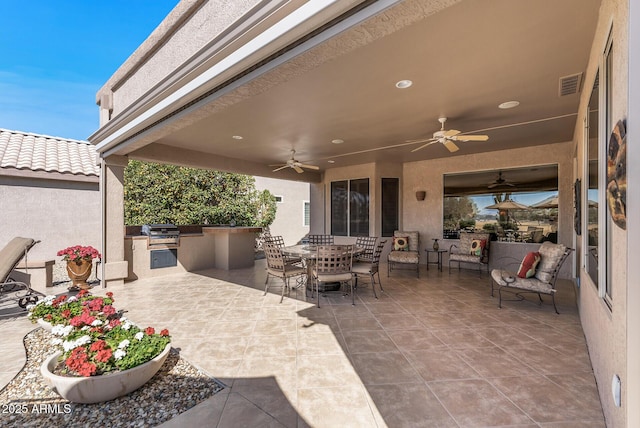 view of patio / terrace featuring area for grilling, a grill, visible vents, a ceiling fan, and outdoor dining space