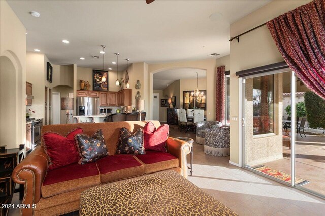 living room featuring an inviting chandelier