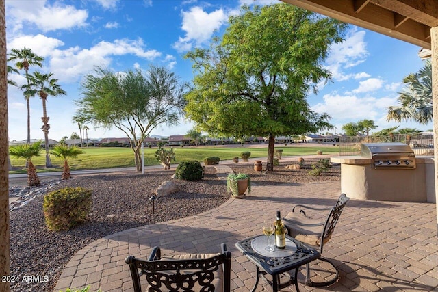 view of patio with area for grilling