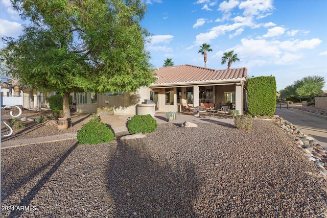 rear view of house with a patio area