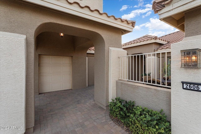 exterior space with a garage