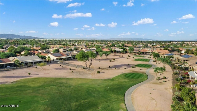 birds eye view of property featuring a mountain view