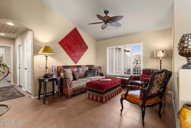 tiled living room featuring ceiling fan