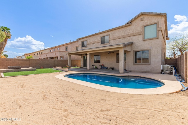view of swimming pool with a patio area and a fenced backyard