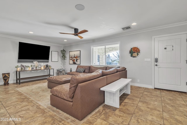 living room featuring ceiling fan and crown molding