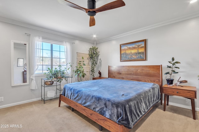 bedroom with light carpet, ceiling fan, and ornamental molding