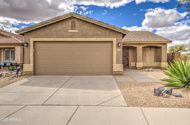 ranch-style home with stucco siding, an attached garage, and concrete driveway