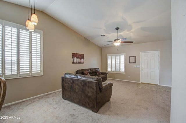 living room featuring ceiling fan, baseboards, carpet, and lofted ceiling