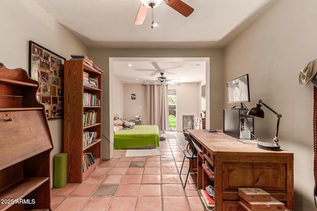 interior space featuring ceiling fan