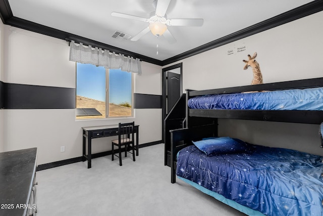 bedroom with carpet floors, a ceiling fan, visible vents, baseboards, and ornamental molding