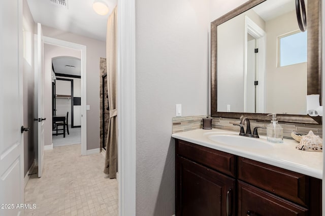 bathroom featuring visible vents and vanity