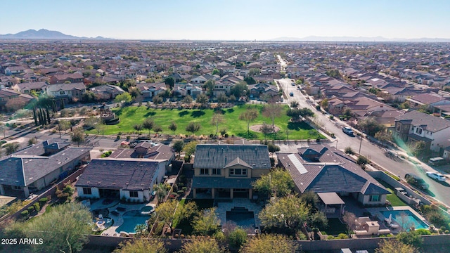 drone / aerial view with a mountain view and a residential view