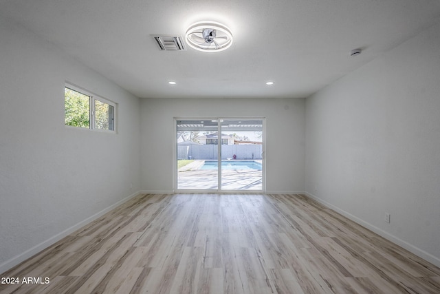 empty room featuring light hardwood / wood-style floors