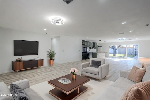 living room featuring light wood-type flooring