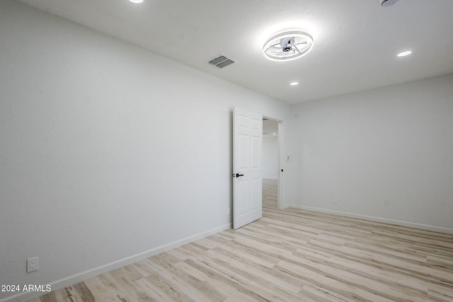 unfurnished room featuring light wood-type flooring