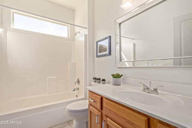 full bathroom featuring toilet, tile patterned floors, vanity, and bathtub / shower combination