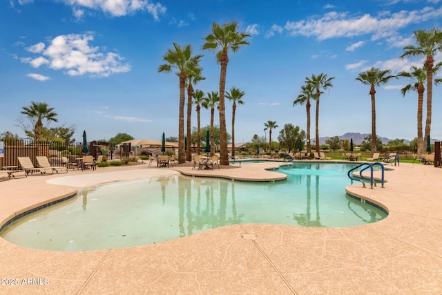 view of swimming pool featuring a patio area