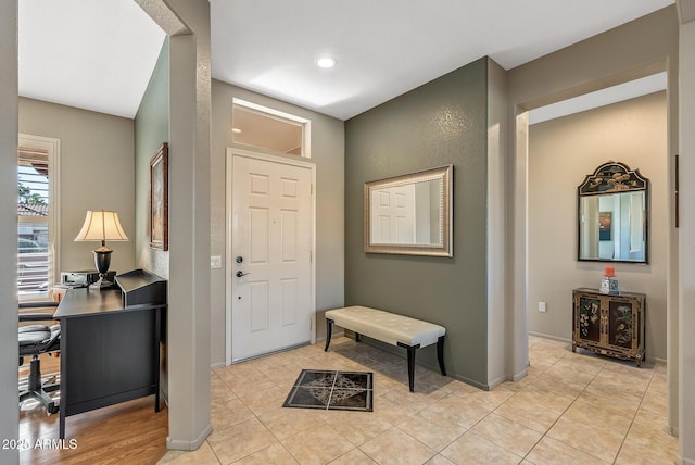 view of tiled foyer entrance