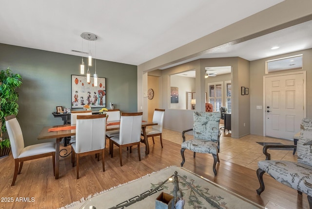 dining area featuring ceiling fan and light hardwood / wood-style floors