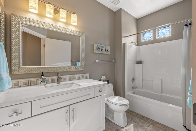 full bathroom featuring vanity, toilet, shower / bath combination, and tile patterned flooring