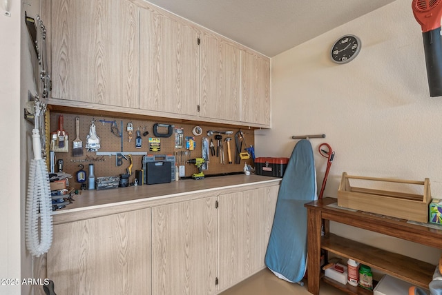 kitchen featuring light brown cabinets