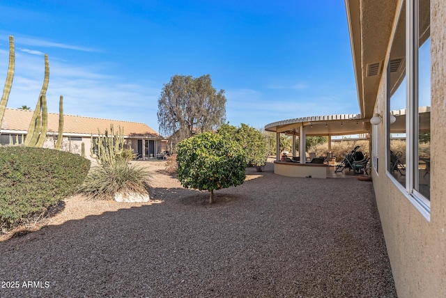 view of yard featuring a pergola and a patio