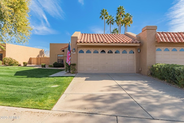 view of front of house with a tile roof, stucco siding, a garage, driveway, and a front lawn