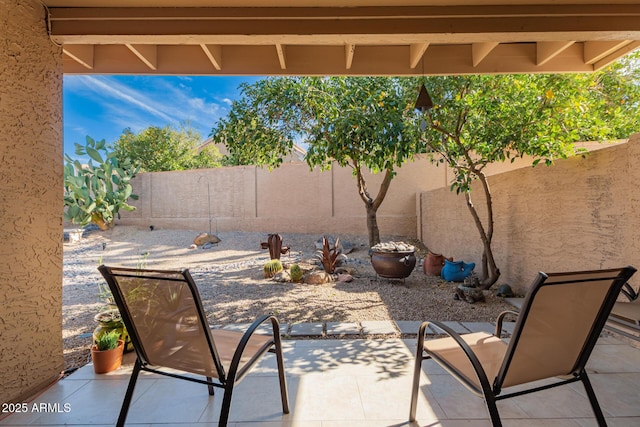 view of patio featuring a fenced backyard