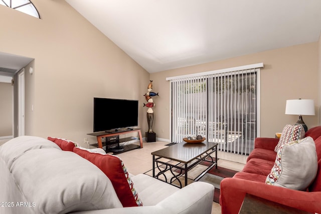 carpeted living area with high vaulted ceiling, visible vents, and baseboards