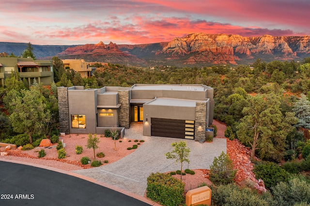 view of front of home featuring a mountain view