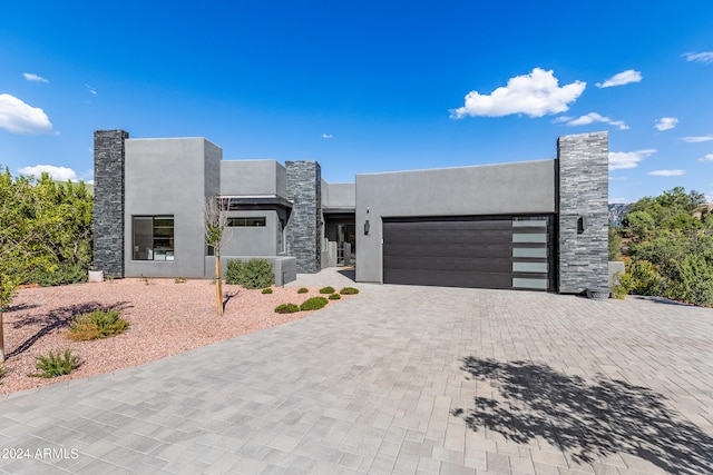 view of front of home with a garage