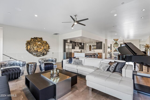 living room with ceiling fan