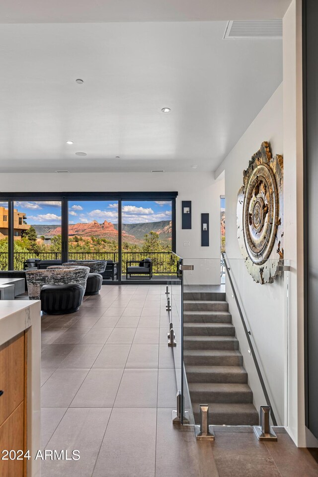 interior space featuring light tile patterned flooring