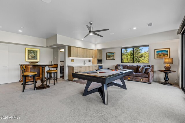 recreation room with billiards, light colored carpet, ceiling fan, and indoor wet bar