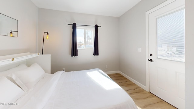 bedroom featuring light wood-type flooring