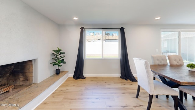 dining room with light hardwood / wood-style flooring