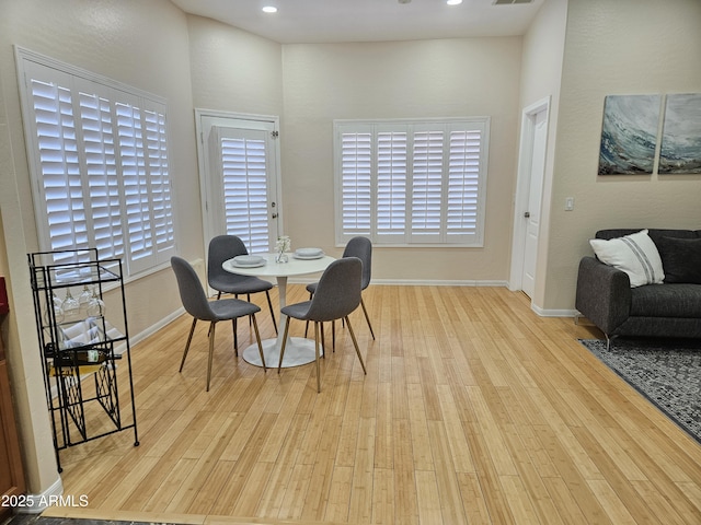 dining room featuring light hardwood / wood-style floors