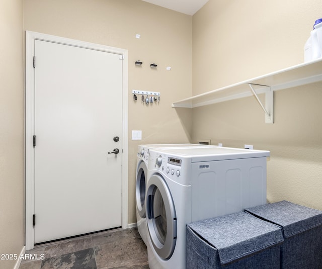 laundry area featuring laundry area and washing machine and clothes dryer