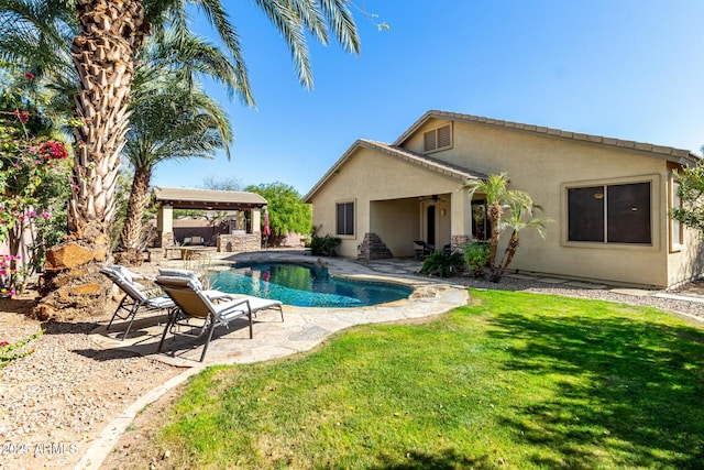 pool featuring a gazebo, a yard, and a patio