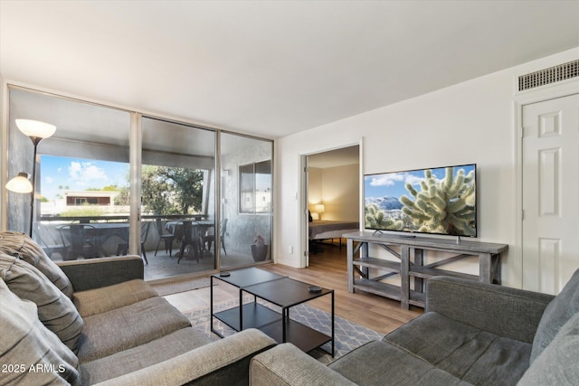7625 E Camelback Rd Unit B226, Scottsdale, AZ 85251 - living area featuring wood finished floors