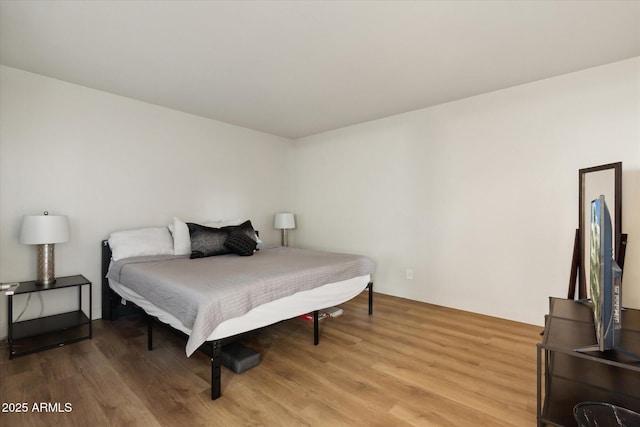 7625 E Camelback Rd Unit B226, Scottsdale, AZ 85251 - bedroom featuring light wood-style floors
