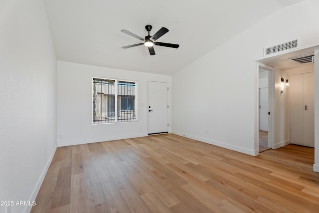 3646 N 69th Ave Unit 55, Phoenix, AZ 85033 - empty room with light wood-style flooring, ceiling fan, lofted ceiling, and visible vents