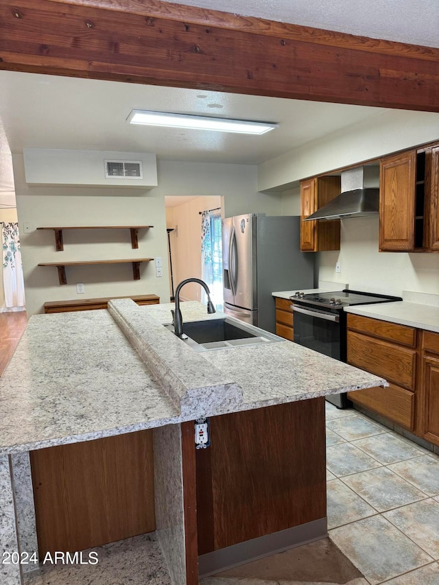 kitchen with electric stove, an island with sink, light tile flooring, wall chimney range hood, and sink