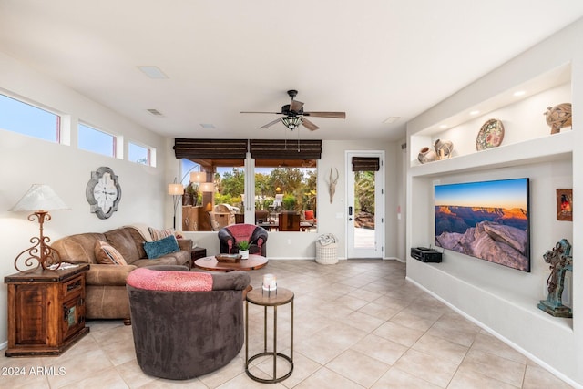 living room with ceiling fan, light tile patterned flooring, and french doors