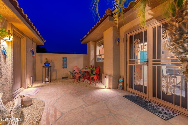 view of patio at twilight