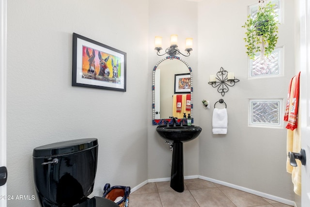 bathroom with tile patterned flooring