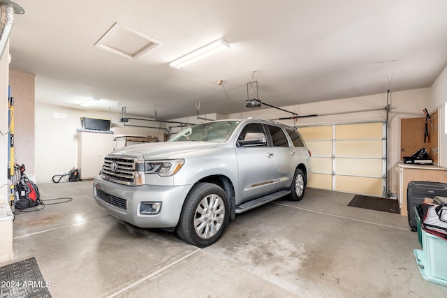 garage featuring a garage door opener